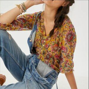 Anthropologie empire waist yellow blouse